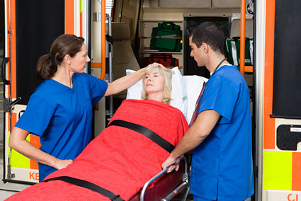 Person being taken in an ambulance