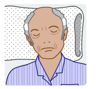 Keith Hughes-Smith asleep in hospital