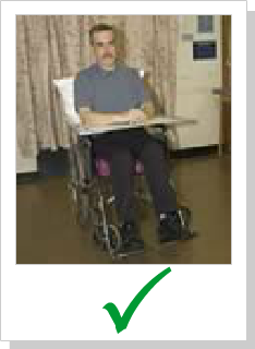 patient sitting properly with arms resting on integral table surface