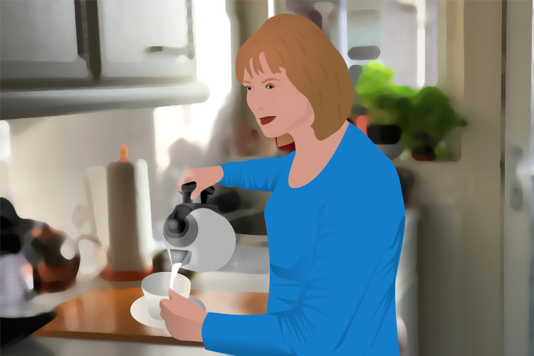 Sally pouring the kettle safely and accurately into the cup, prior to stroke