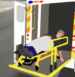 Dave on emergency trolley going into ambulance